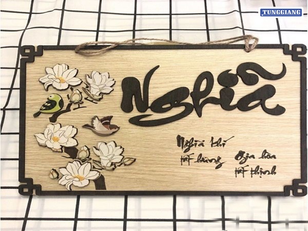 Khắc chữ thư pháp trên gỗ